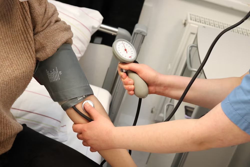Caregiver Getting Blood Pressure