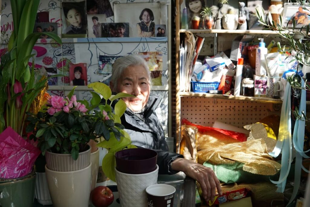 Elderly Woman In A Shop