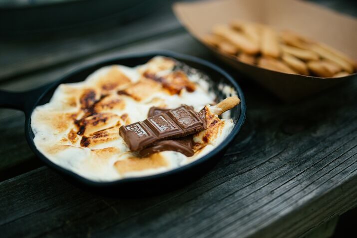 Photo of a chocolate peanut butter fudge which is an easy diy candy recipe.