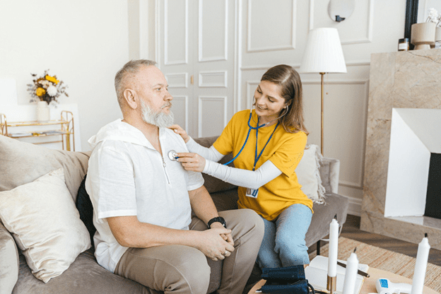 A doctor conducting a consultation on the patient.